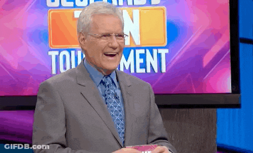 Man Laughing In Front Of Tournament Sign GIF