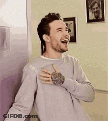 Man Laughing Next To Refrigerator GIF