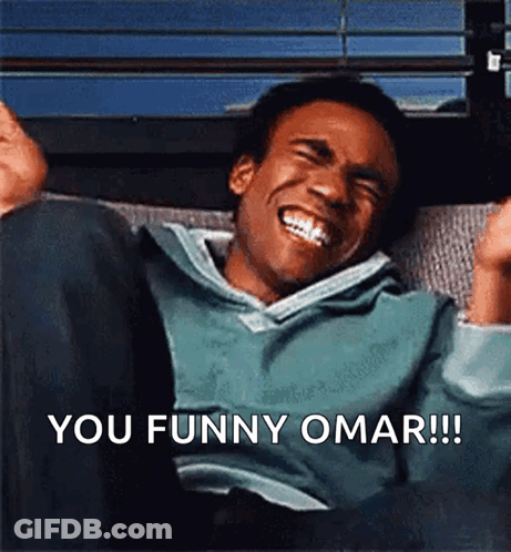 Man Laughing On Couch Saying You Funny Omar GIF