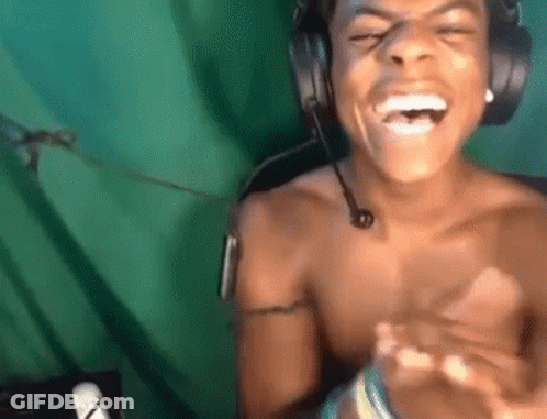Man Laughing Shirtless With Headphones GIF