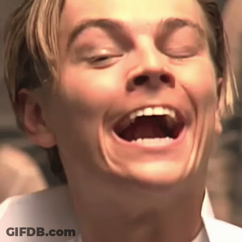 Man Laughing With Eyes Closed GIF