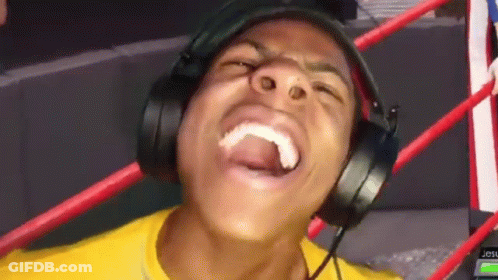 Man Laughing With Headphones And Tongue Out GIF