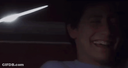 Man Laughing With Light Coming Out Of Mouth GIF