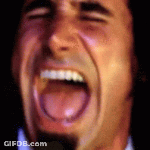 Man Laughing With Mouth Open And Tongue Out GIF