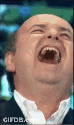 Man Laughing With Mouth Open Eyes Closed GIF