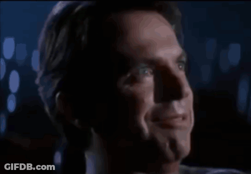 Man Laughing With Mouth Open In Dark GIF