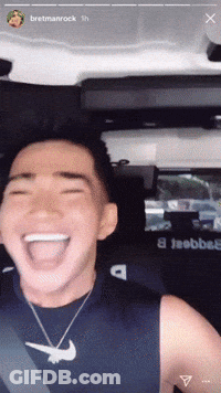 Man Laughing With Nike Necklace GIF