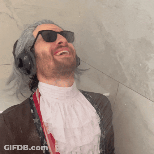 Man Laughing With Sunglasses And Headphones GIF