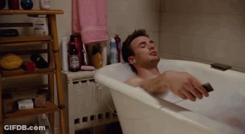 Man Laying In Bathtub With Budweiser GIF
