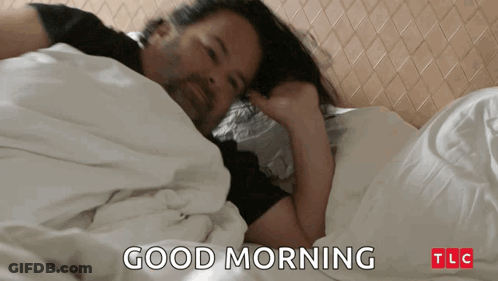 Man Laying In Bed Saying Good Morning GIF