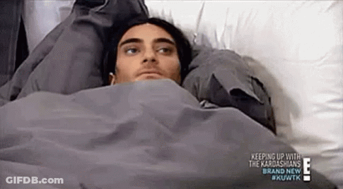 Man Laying In Bed With Blanket On Head GIF