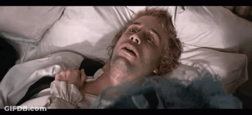 Man Laying In Bed With Mouth Open GIF