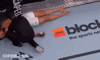 Man Laying In Boxing Ring With Join The Sports Network Sign GIF