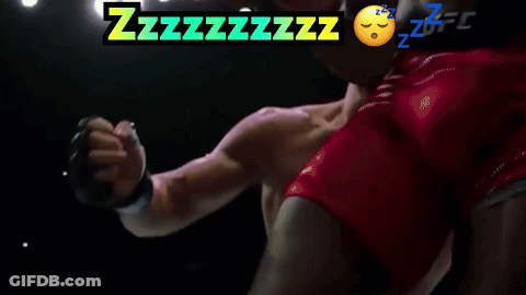 Man Laying In Boxing Ring With Zzzzzzzzz Above GIF