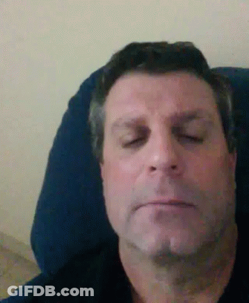 Man Laying In Chair Eyes Closed GIF