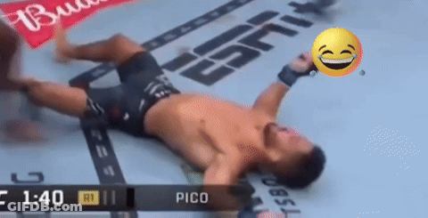 Man Laying In Front Of ESPN Sign GIF