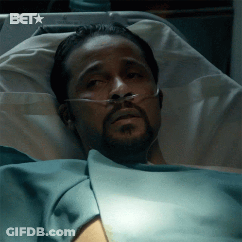 Man Laying In Hospital Bed With BET Logo GIF
