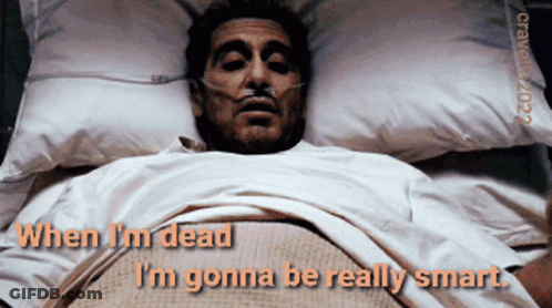 Man Laying In Hospital Bed With Oxygen Mask GIF