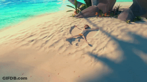 Man Laying In Sand On Beach GIF