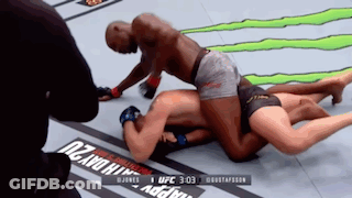 Man Laying On Another In UFC Match GIF