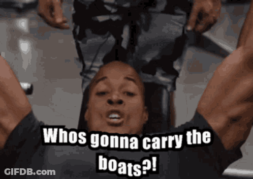 Man Laying On Back Saying Whos Gonna Carry The Boats GIF