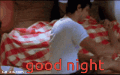 Man Laying On Bed Saying Good Night GIF