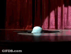 Man Laying On Bed With Puppet On Back GIF