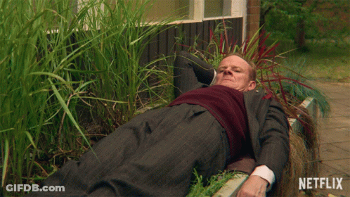 Man Laying On Bench With Netflix GIF