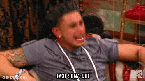 Man Laying On Couch Arms Outstretched Says Taxi Sona Qui GIF
