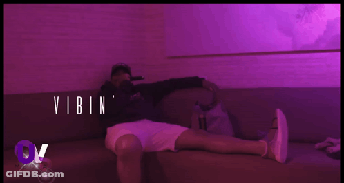 Man Laying On Couch Vibin GIF