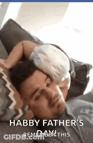 Man Laying On Couch With Baby Sleeping On Head GIF