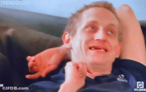 Man Laying On Couch With Rtlzwei GIF