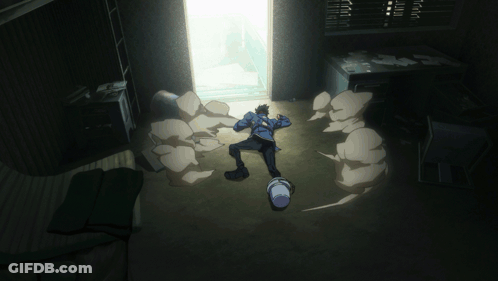 Man Laying On Floor In Dark Room With Smoke GIF