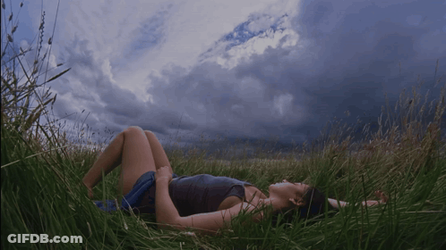 Man Laying On Floor In Front Of Sign Saying Ri GIF