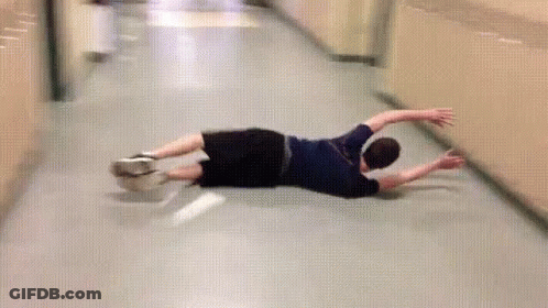 Man Laying On Floor In Hallway GIF