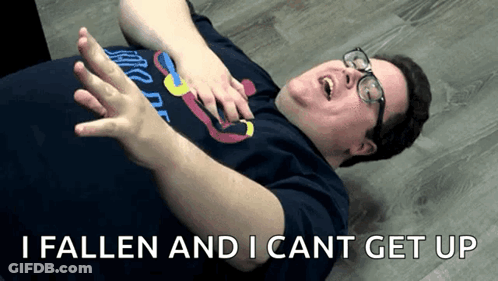 Man Laying On Floor Saying I Fallen And I Cant Get Up GIF