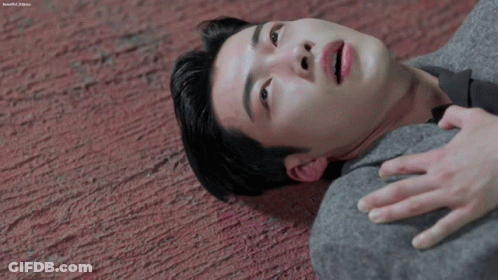 Man Laying On Floor With Hand On Chest Saying Beautiful GIF