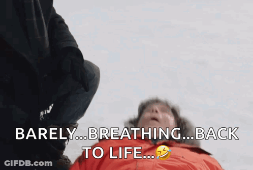 Man Laying On Ground Barely Breathing Back To Life GIF