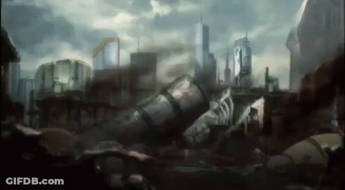 Man Laying On Ground In Front Of City GIF