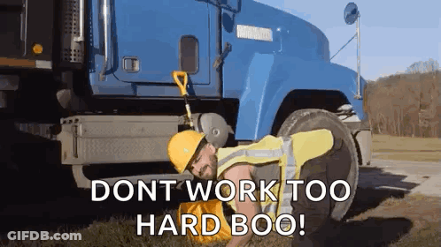 Man Laying On Ground Next To Blue Truck With Dont Work Too Hard Boo GIF