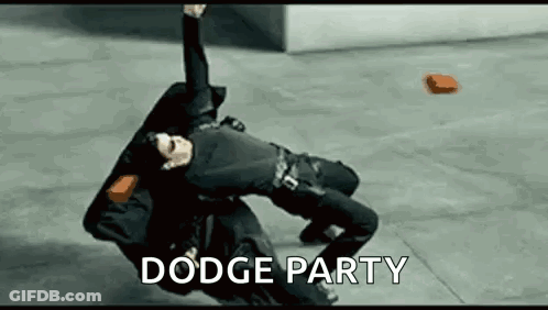 Man Laying On Ground With Brick Dodge Party GIF