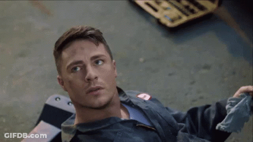 Man Laying On Ground With Firefighter Patch GIF