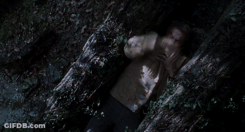 Man Laying On Ground With Hands Over Face GIF