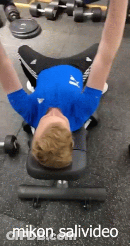 Man Laying On Gym Bench Arms Outstretched GIF