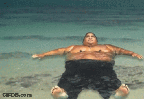 Man Laying On His Back In Water GIF