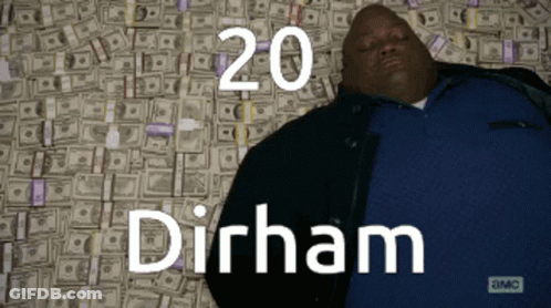 Man Laying On Pile Of Money Dirham GIF