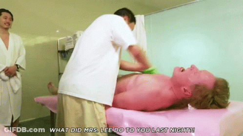 Man Laying On Pink Table Asking What Did Mrs Lee Do To You Last Night GIF