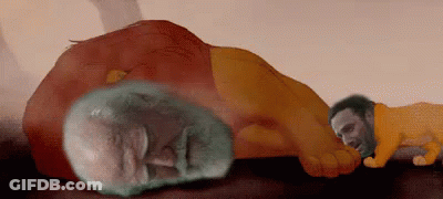 Man Laying On Table Next To Large Orange Object GIF