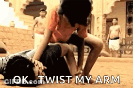 Man Laying On Top Of Another GIF