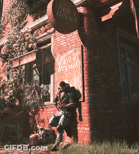 Man Leaning Against Brick Wall With Left Bread Sign GIF